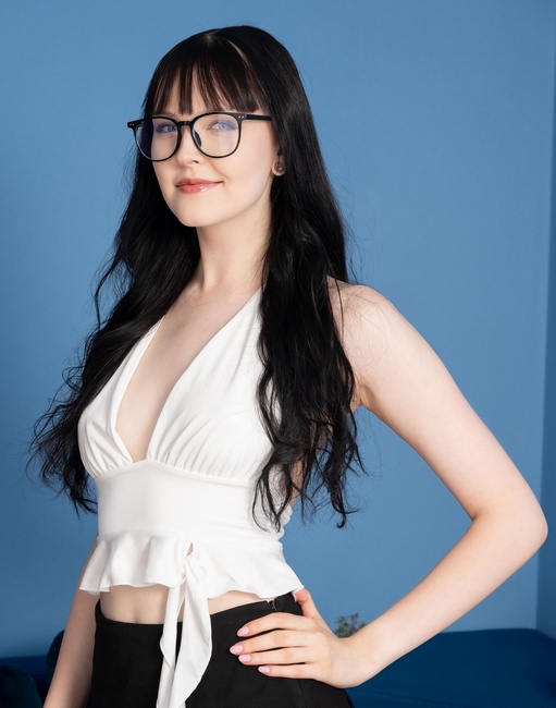 Amelia Riven with blue eyes and black hair